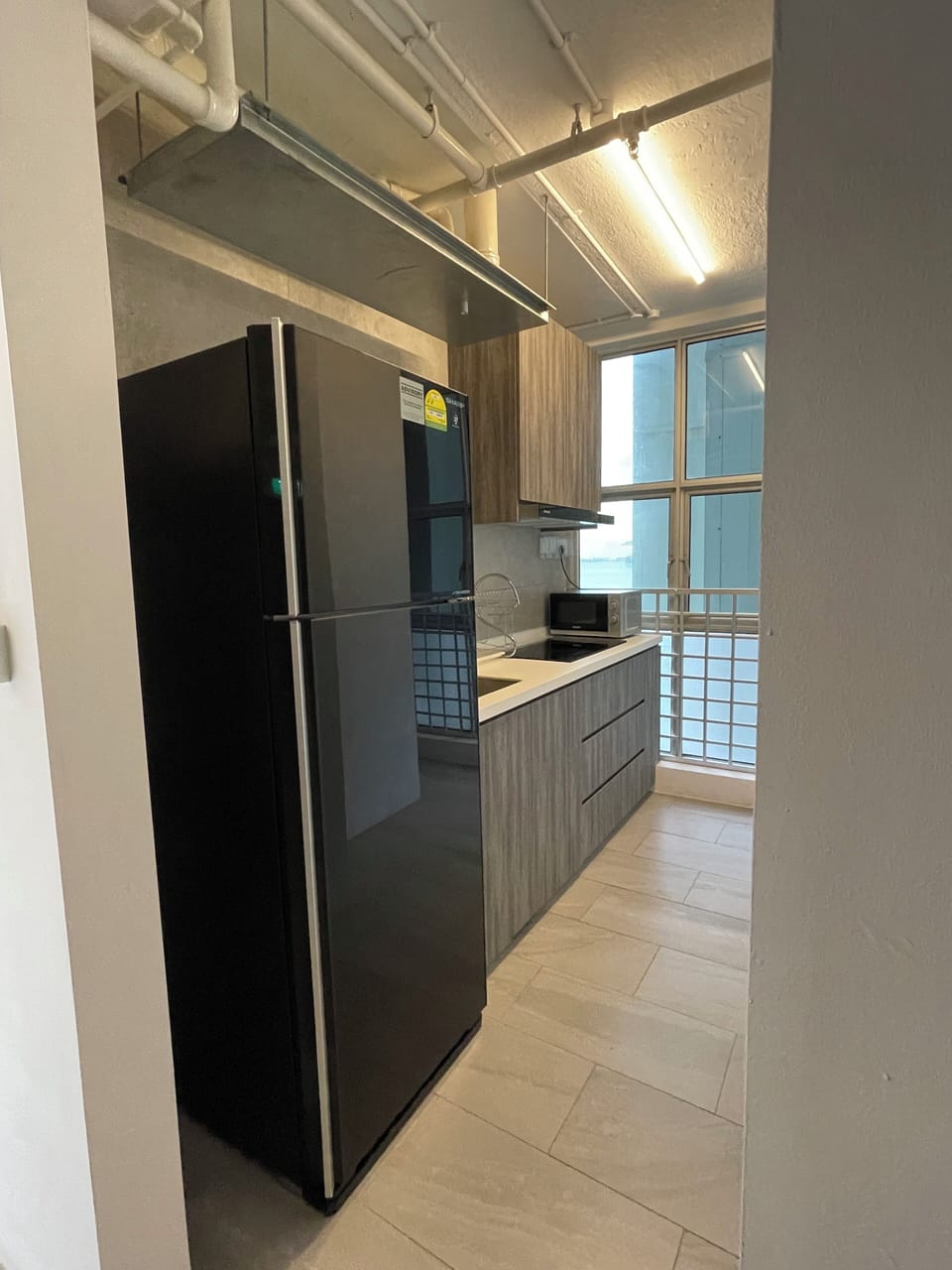 Fridge, shared microwave, stovetop, electric kettle
