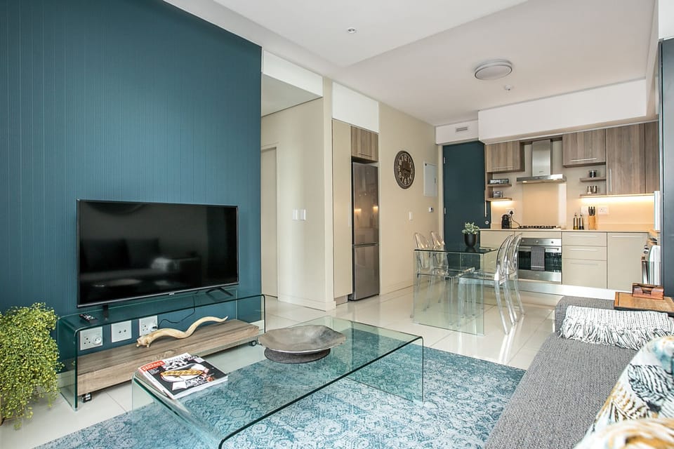 Deluxe Apartment, 1 Bedroom | Living area | 42-inch flat-screen TV with digital channels, TV
