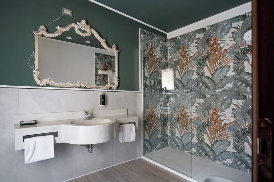Standard Double or Twin Room | Bathroom | Combined shower/tub, hair dryer, slippers, bidet