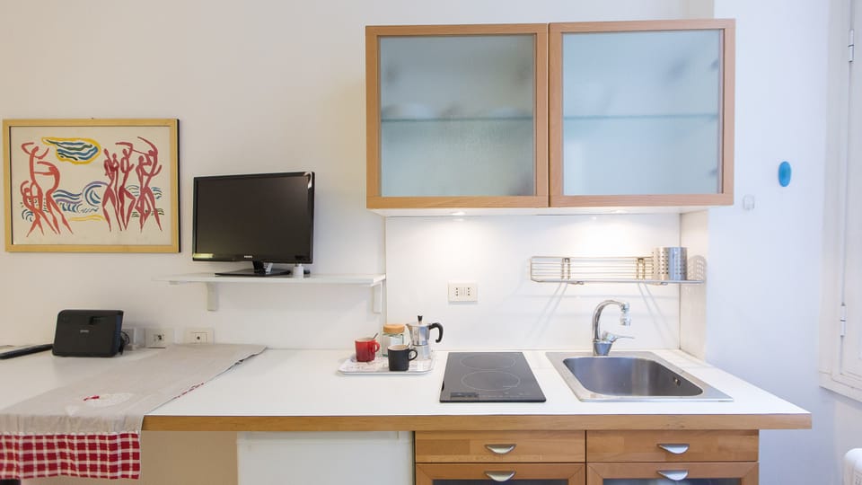 Apartment, 1 Bedroom | Private kitchen | Full-size fridge, stovetop, espresso maker, coffee/tea maker