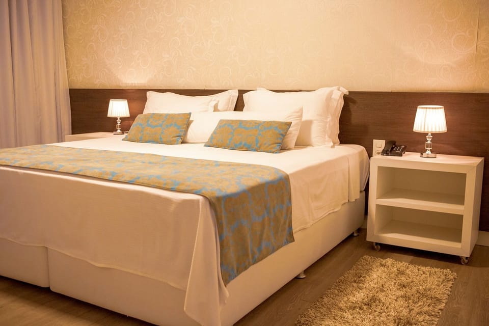 Romantic Studio Suite | Bathroom | Hair dryer, towels, soap