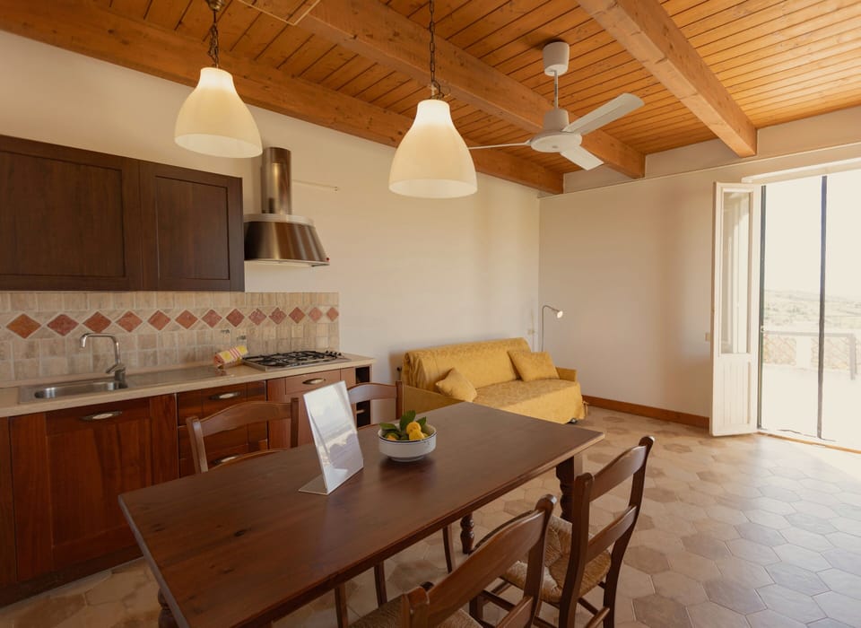 Peonia Apartment with terrace, mountain view | Private kitchen | Microwave, electric kettle, highchair, cleaning supplies