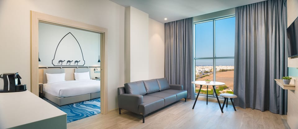 Suite, 1 Bedroom | In-room safe, desk, laptop workspace, blackout drapes