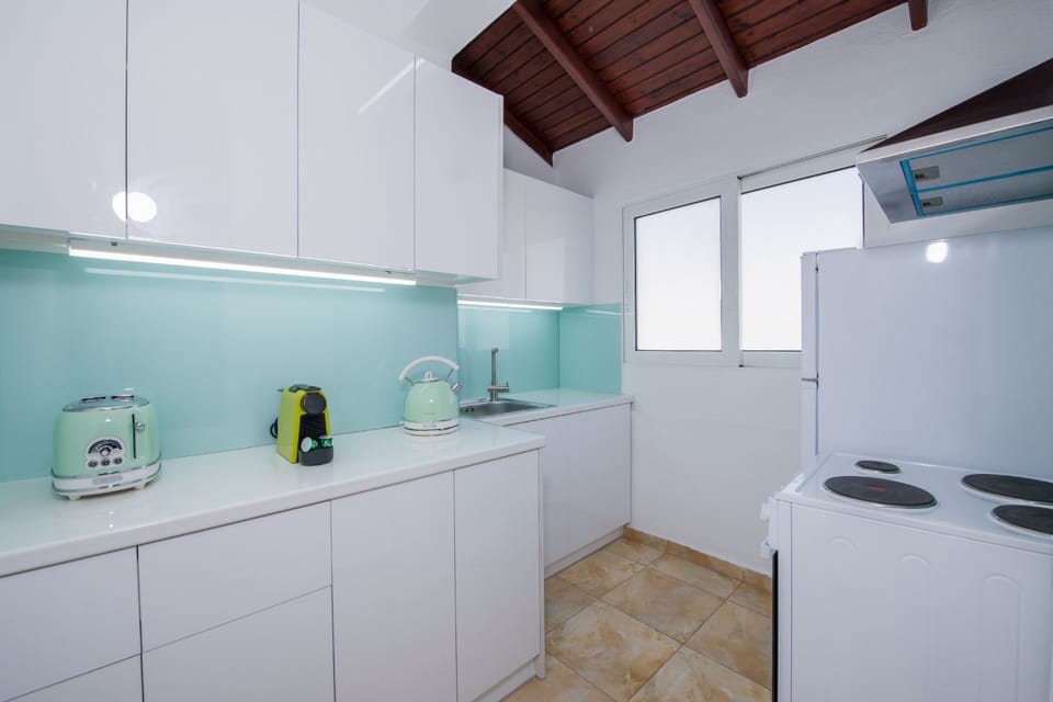Fridge, oven, stovetop, espresso maker