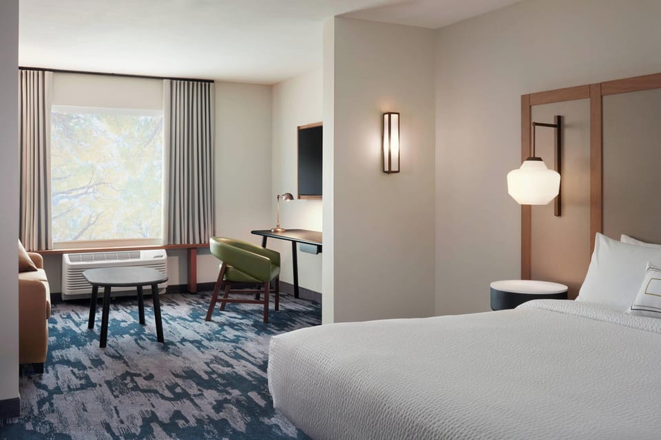 Suite, 1 King Bed with Sofa bed | 1 bedroom, desk, laptop workspace, bed sheets