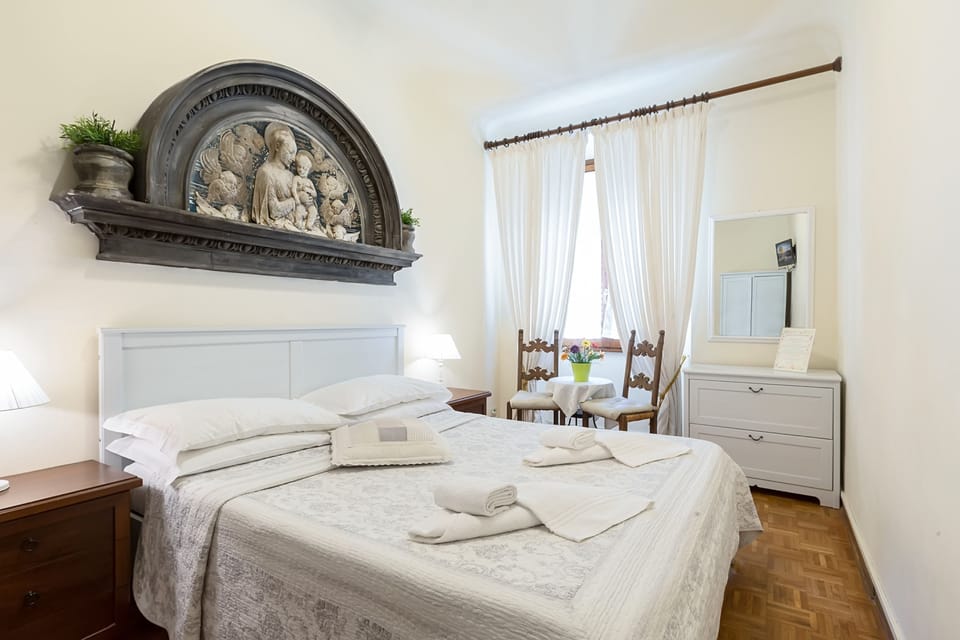 Double Room, Private Bathroom (External) | Minibar, in-room safe, individually furnished, iron/ironing board