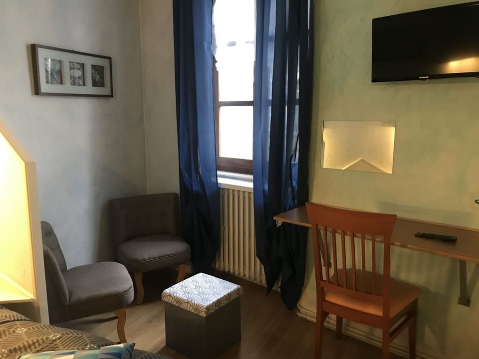 Twin Room | Living area | 60-cm LCD TV with digital channels, TV