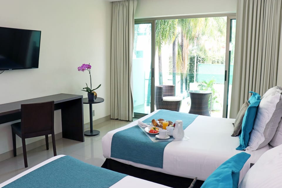Standard Double Room, 2 Queen Beds, Balcony | In-room safe, blackout drapes, free WiFi, bed sheets