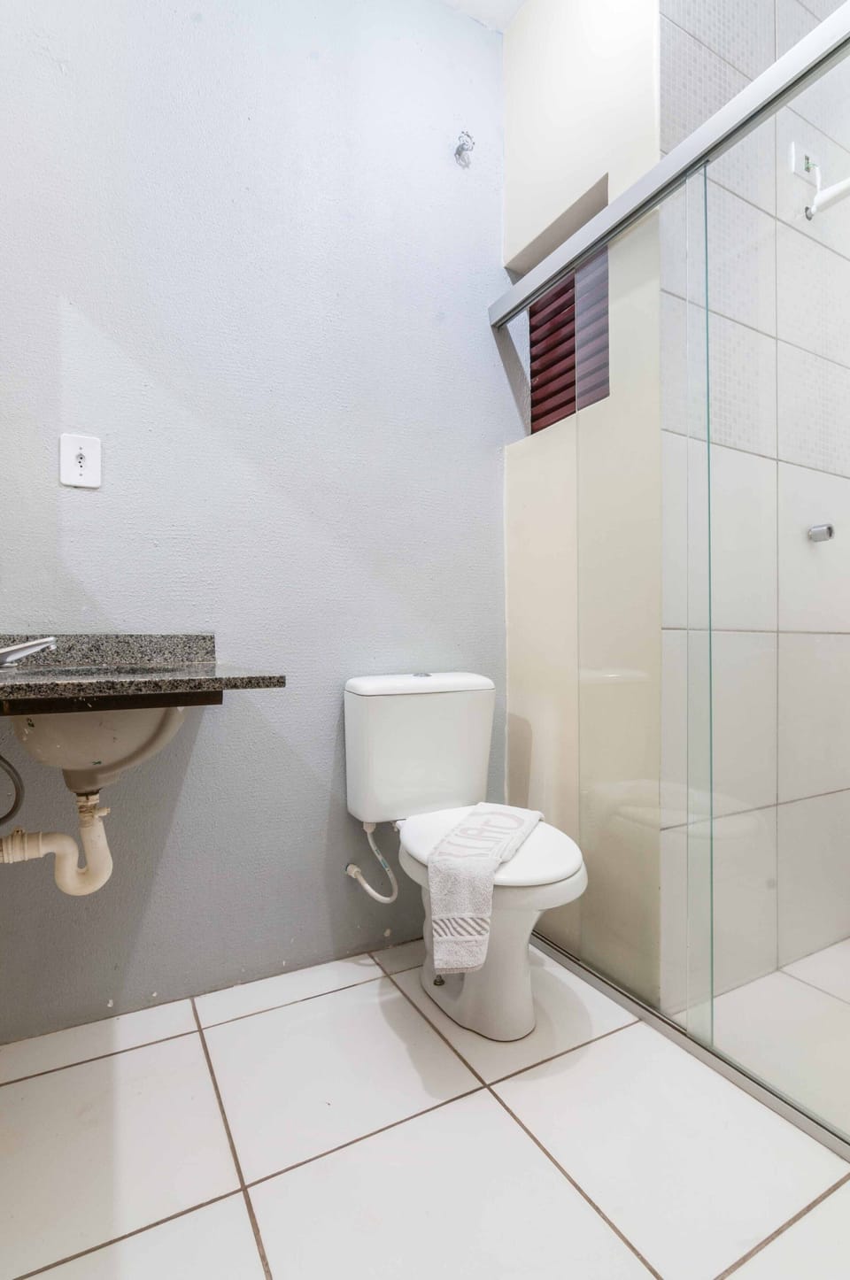 Shower, towels, toilet paper