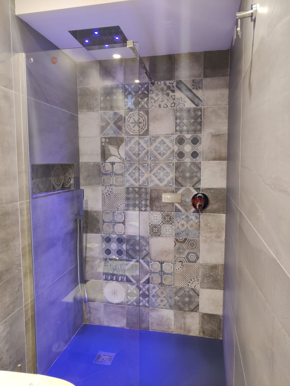 Shower, hydromassage showerhead, designer toiletries, hair dryer