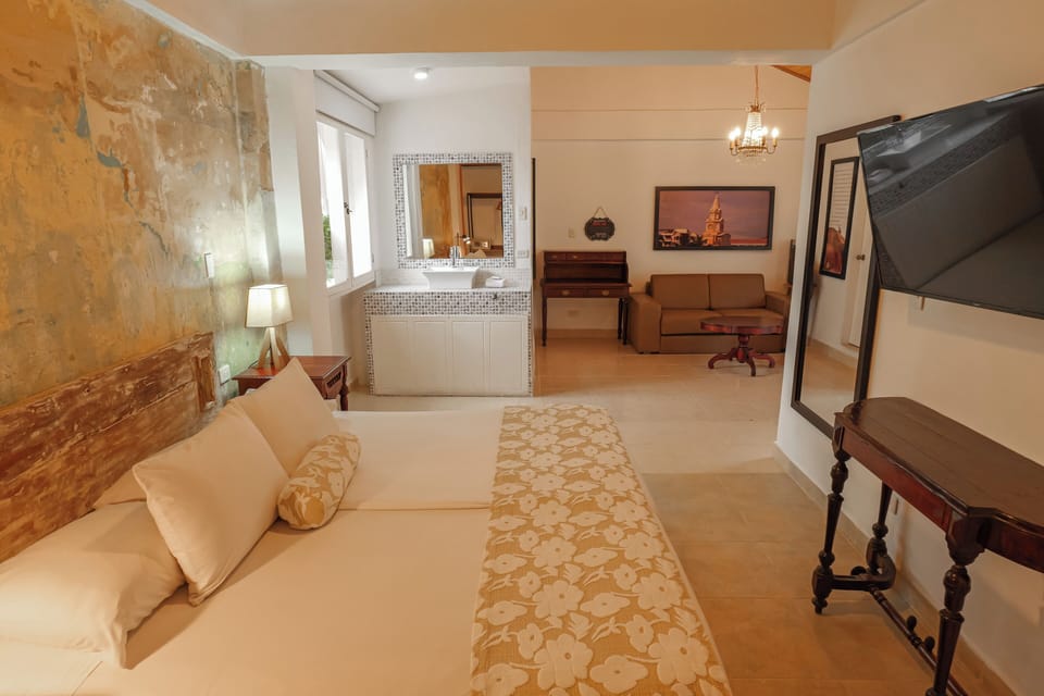 Kartaxa | Premium bedding, down comforters, in-room safe, individually decorated