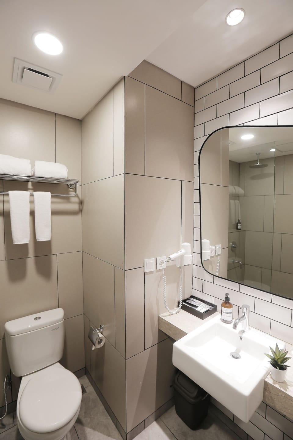 Shower, free toiletries, hair dryer, slippers