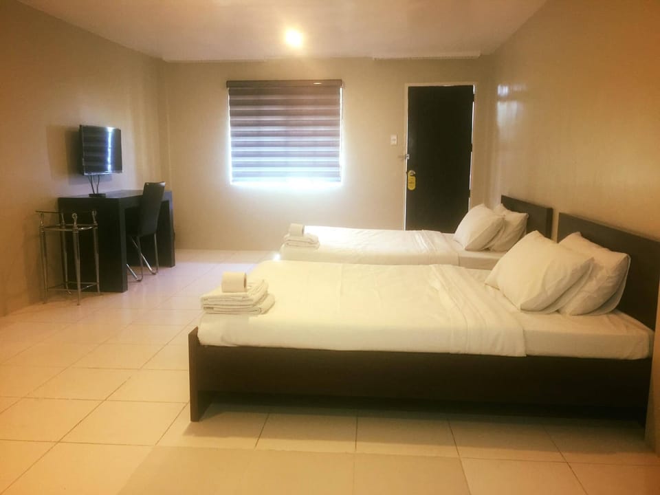 VIP Family Room | Laptop workspace, blackout drapes, iron/ironing board, WiFi (free)