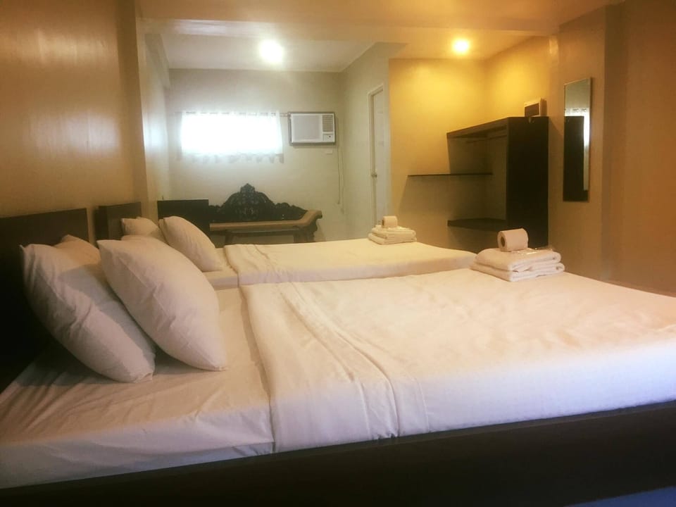VIP Family Room | Laptop workspace, blackout drapes, iron/ironing board, WiFi (free)