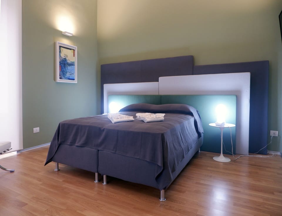 Deluxe Double Room, Private Bathroom (External) | In-room safe, desk, blackout drapes, iron/ironing board