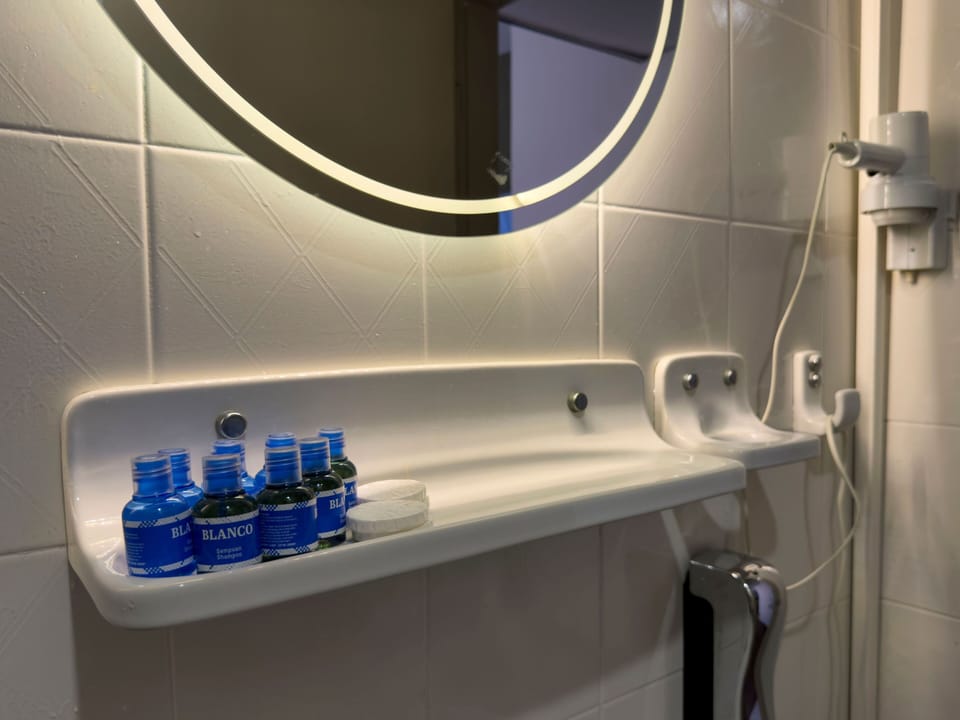 Shower, free toiletries, hair dryer, towels