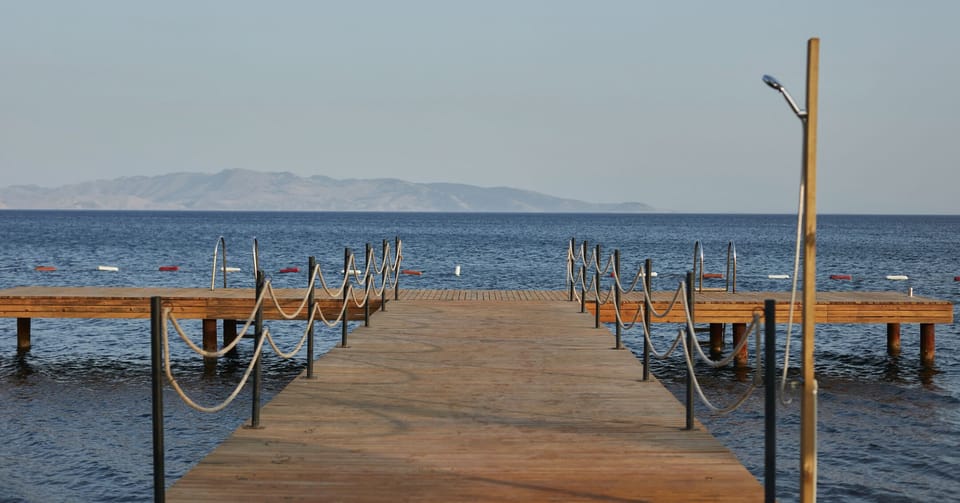 Private beach, white sand, free beach cabanas, sun loungers