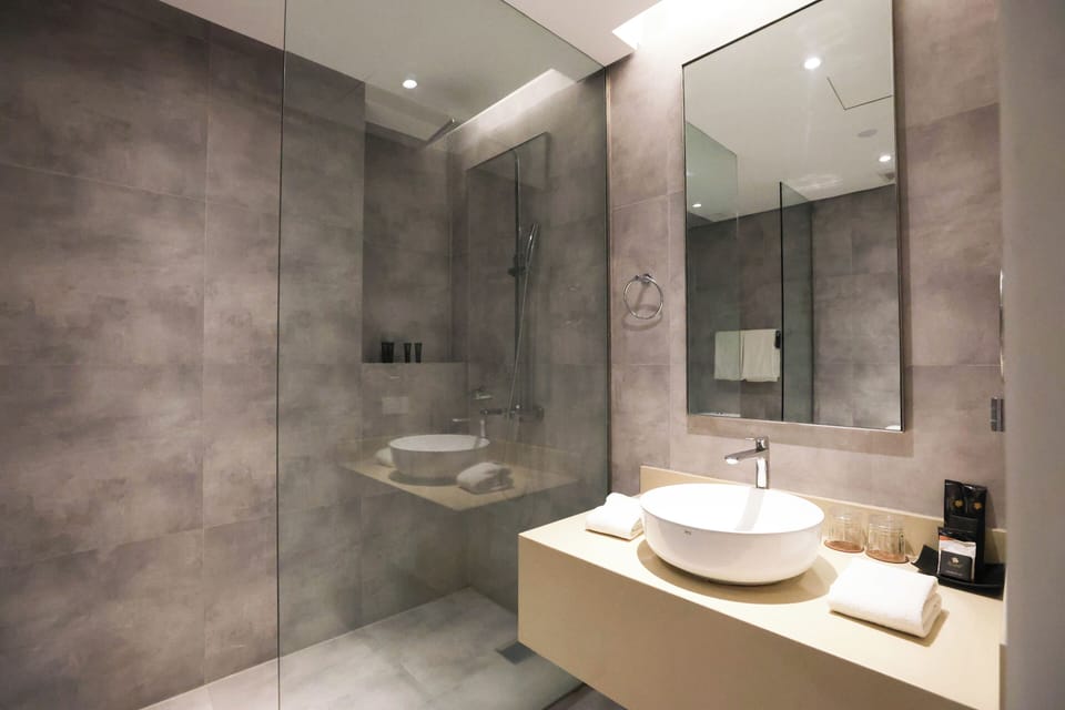 Shower, free toiletries, hair dryer, slippers