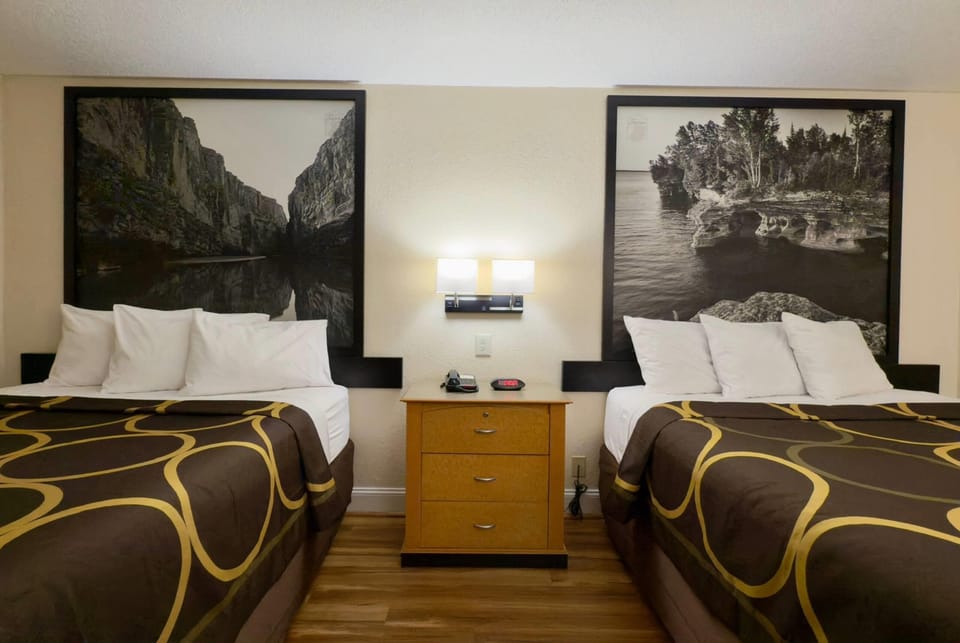 Desk, blackout drapes, iron/ironing board, rollaway beds