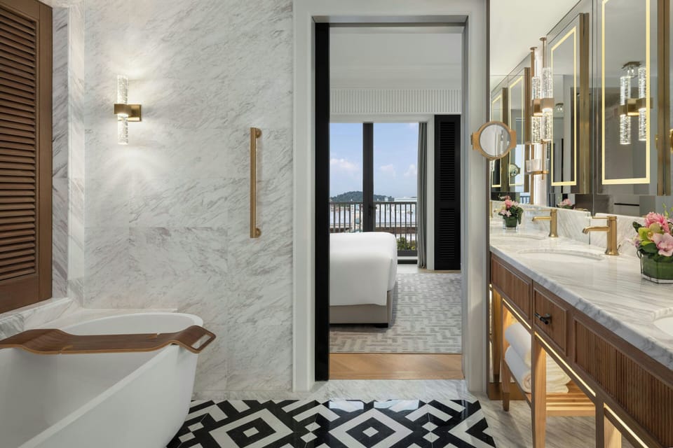 Grand Suite, 1 King Bed, Smoking | Bathroom | Shower, free toiletries, hair dryer, slippers