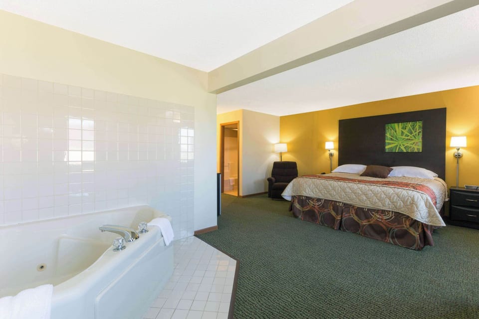 Deluxe Studio Suite, 1 King Bed, Non Smoking | Desk, blackout drapes, iron/ironing board, free cribs/infant beds