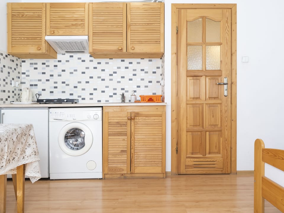 Basic Double Room, Private Bathroom (With Kitchenette) | Living area | 32-inch LED TV with cable channels, TV