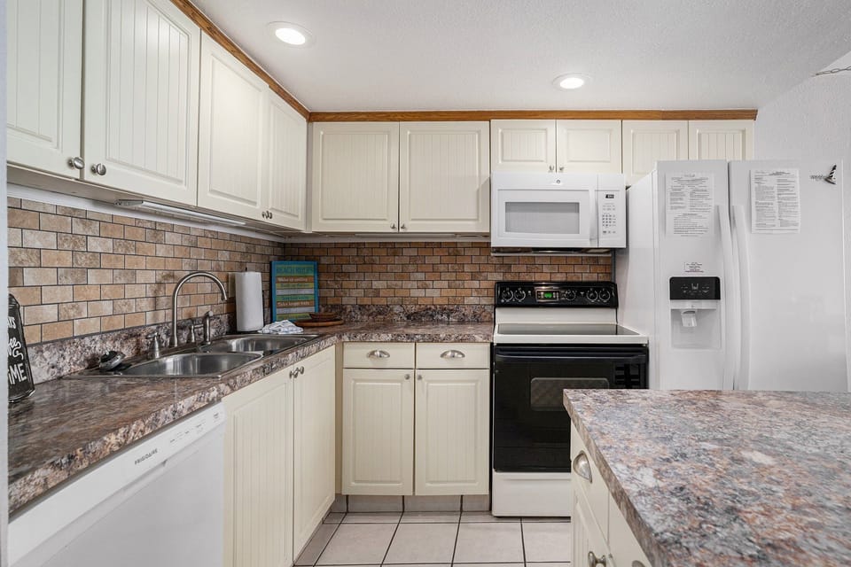 Condo, 2 Bedrooms | Private kitchen | Coffee/tea maker, fridge, oven, toaster