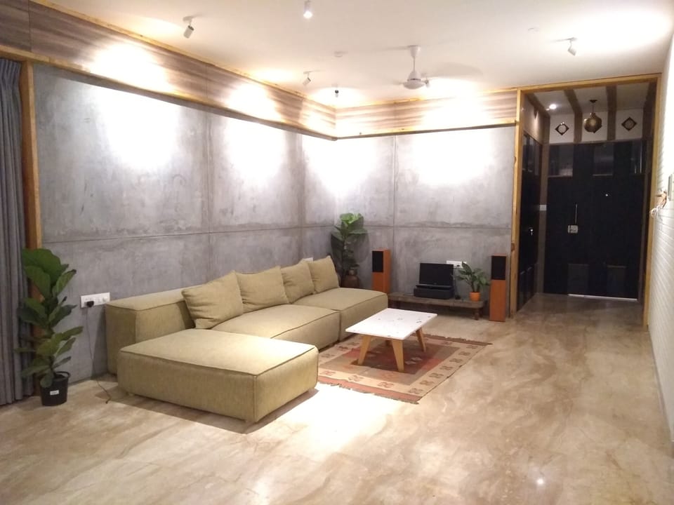3 BHK Luxury Serviced Apartment | Living room | Flat-screen TV