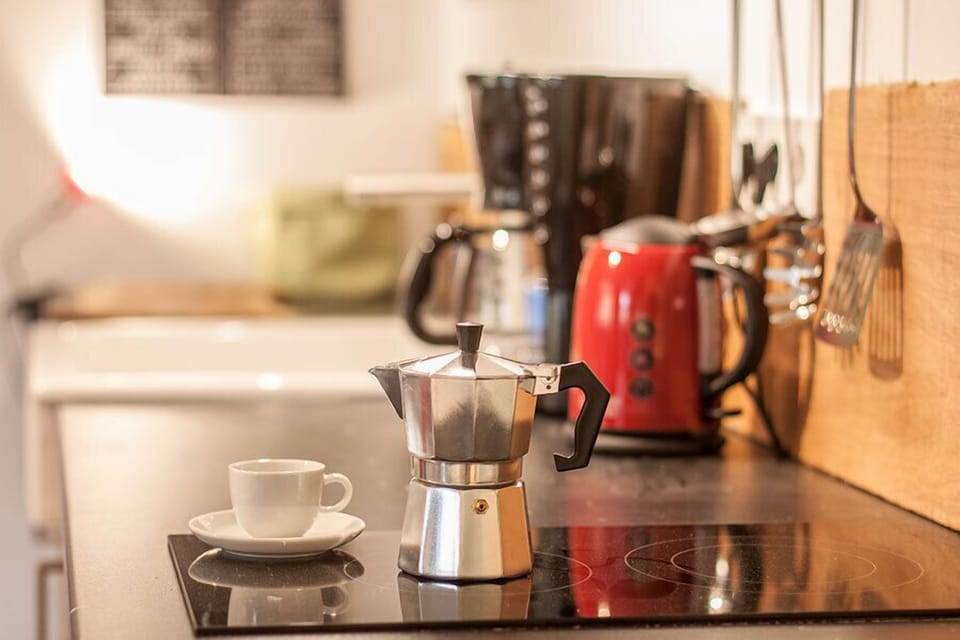 Apartment | Private kitchen | Full-size fridge, stovetop, coffee/tea maker, electric kettle