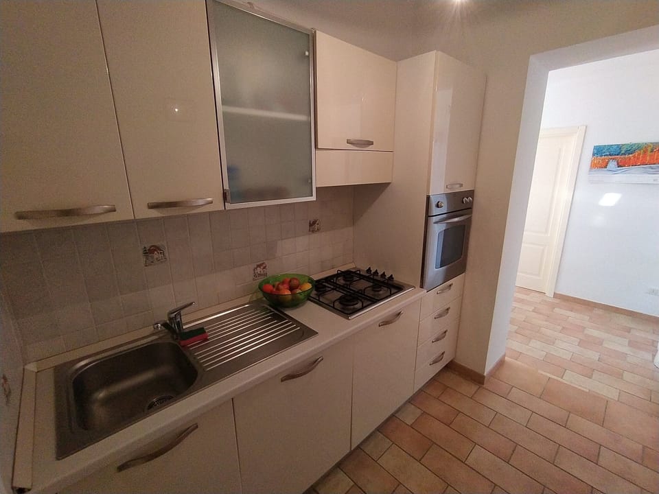 Apartment, 3 Bedrooms, Patio, Garden Area (Italia) | Private kitchen | Full-size fridge, oven, stovetop, dishwasher