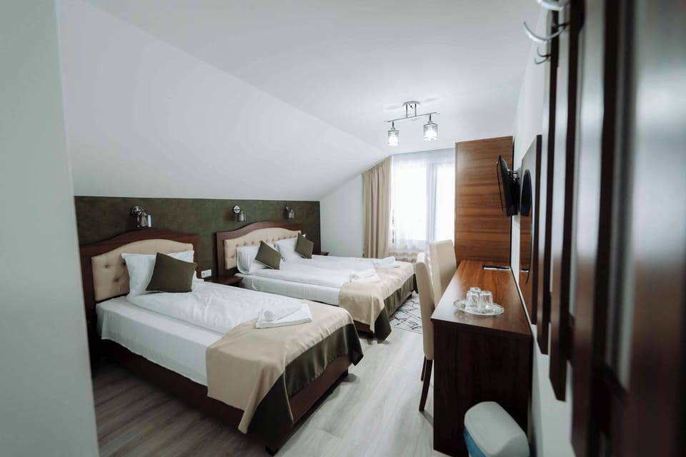 Room, Multiple Beds, Balcony | Iron/ironing board, free WiFi, bed sheets