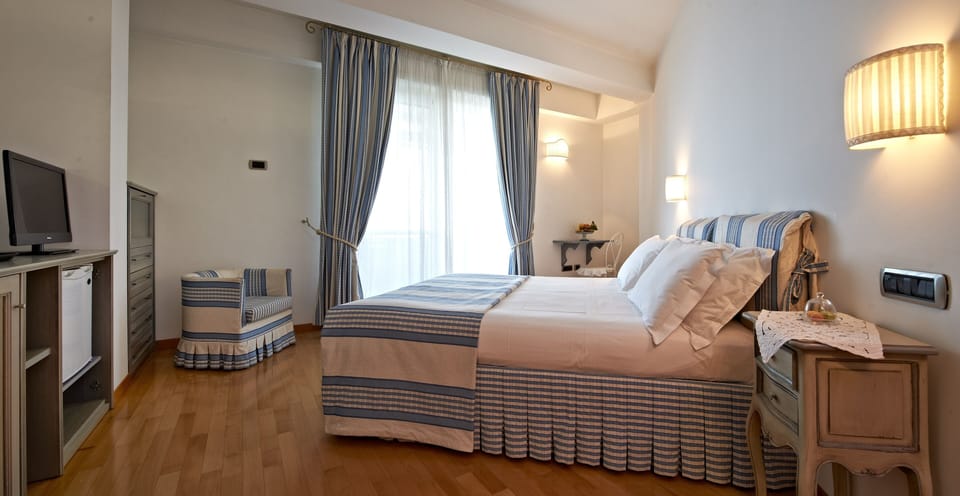 Frette Italian sheets, premium bedding, down comforters