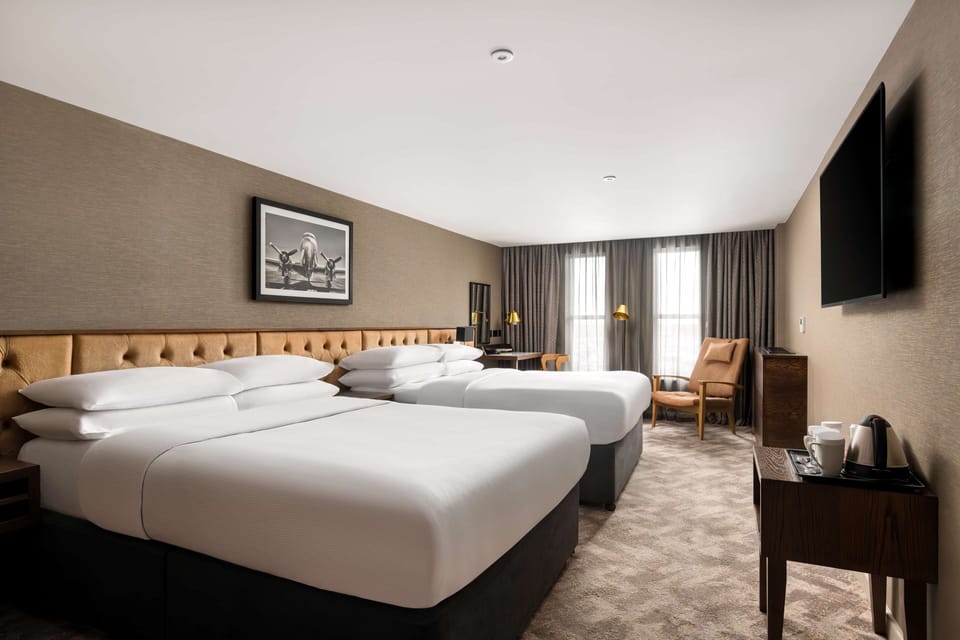 Family Room | Minibar, in-room safe, laptop workspace, soundproofing