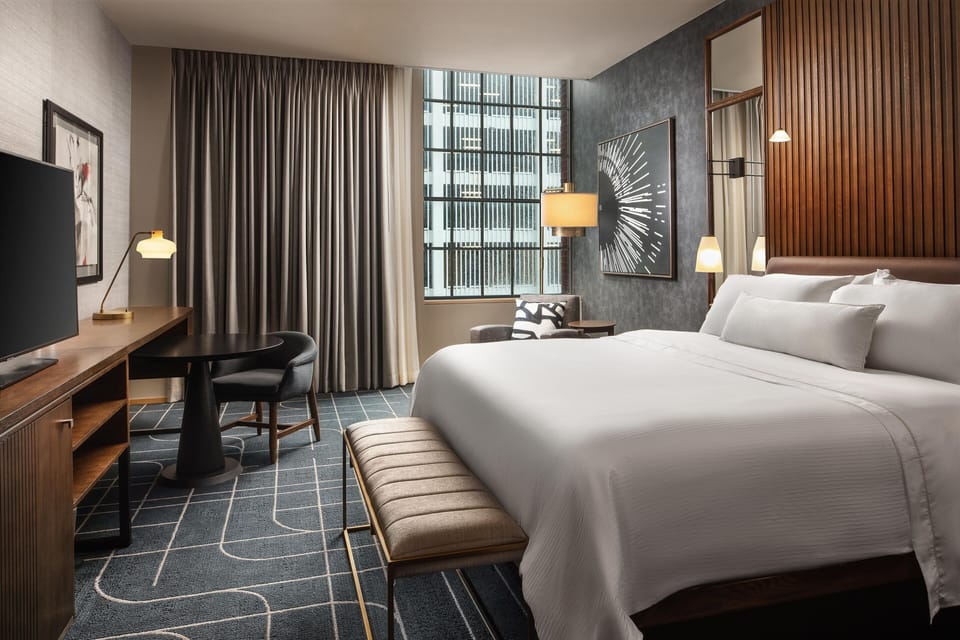 Premium bedding, down comforters, pillowtop beds, in-room safe