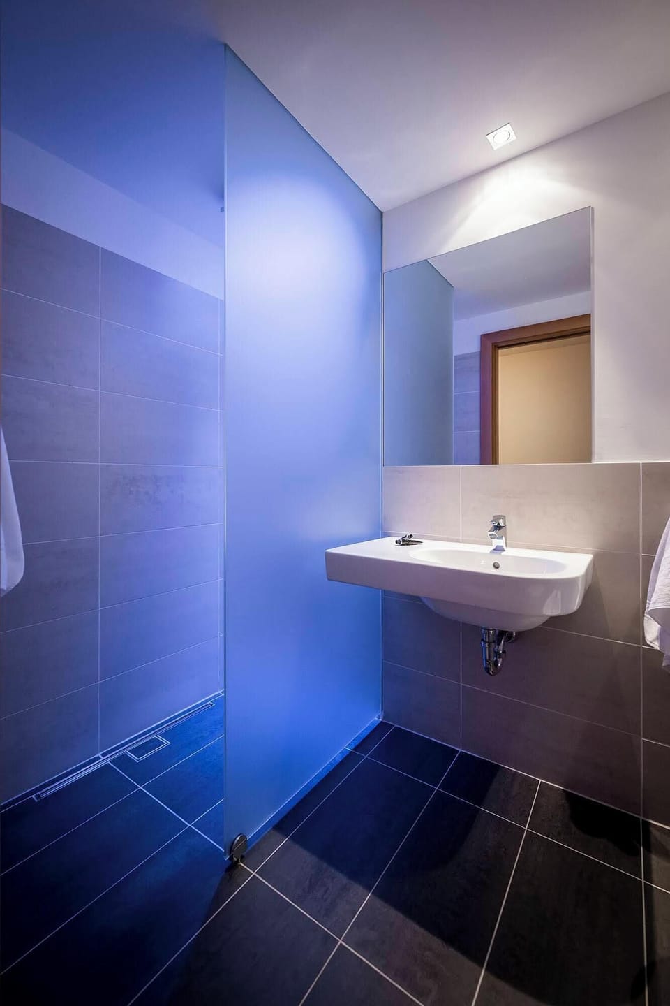 Shower, rainfall showerhead, eco-friendly toiletries, hair dryer