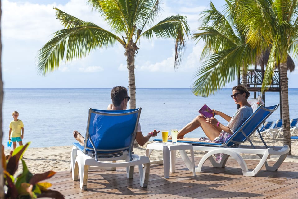 Private beach, sun loungers, beach towels, windsurfing