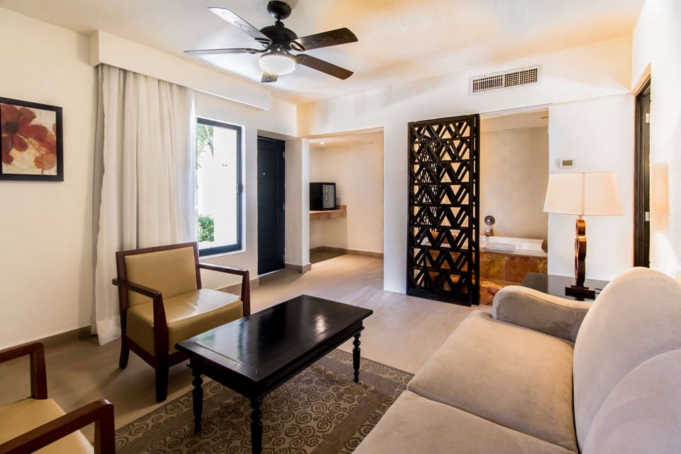 Premium Suite (Level) | Minibar (free items), in-room safe, blackout drapes, iron/ironing board