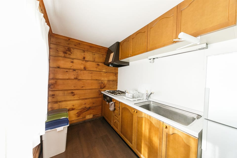 Family Cabin | Private kitchenette | Fridge, microwave, stovetop, electric kettle