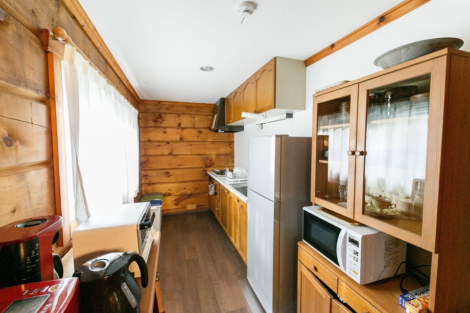 Family Cabin | Private kitchenette | Fridge, microwave, stovetop, electric kettle