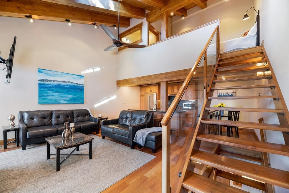 Condo, Multiple Beds, Lake View (MV32: Lakeland Village Luxury Condo W) | Living room | Fireplace