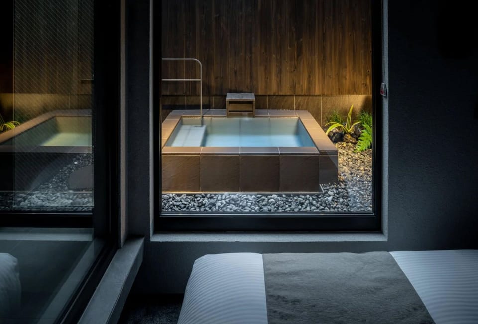 Deluxe Room-IWA- | Bathroom | Separate tub and shower, rainfall showerhead, free toiletries