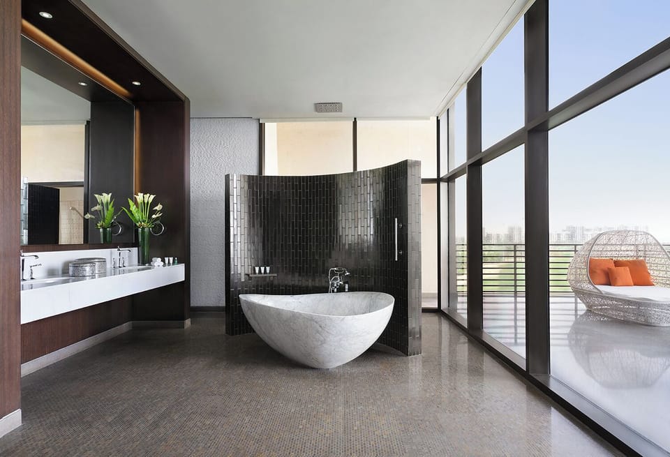 Presidential Suite - King Bed & 2 Queen Beds | Bathroom | Separate tub and shower, rainfall showerhead, designer toiletries