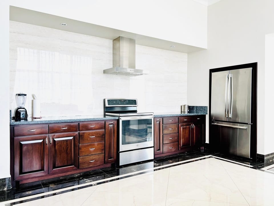 Superior Suite, 1 King Bed, Ocean View (Jacuzzi) | Private kitchen | Coffee/tea maker, highchair