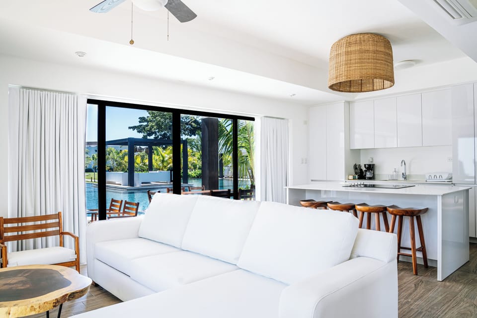 Premium Villa, Multiple Beds, Pool Access | Down comforters, in-room safe, laptop workspace, blackout drapes