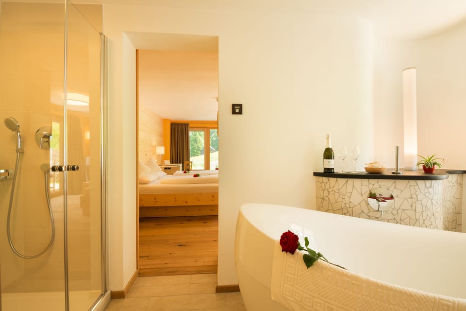 Junior Room, Bathtub, Mountain View | Bathroom | Shower, rainfall showerhead, free toiletries, hair dryer
