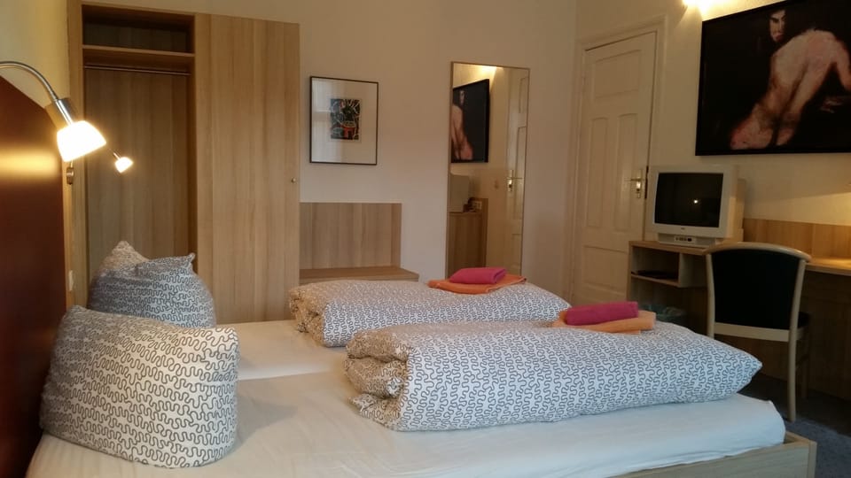 Double Room | Desk, blackout drapes, iron/ironing board, free cribs/infant beds