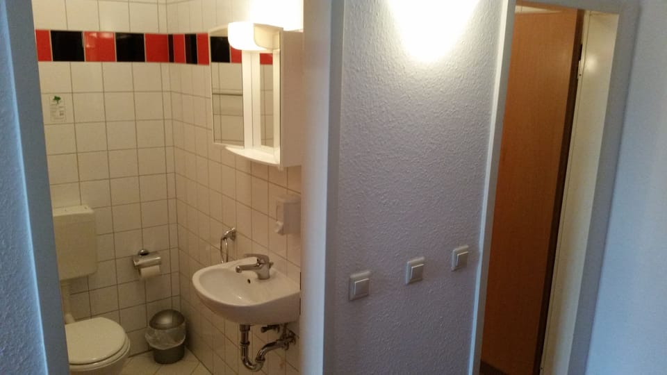 Quadruple Room | Bathroom | Shower, hair dryer, towels