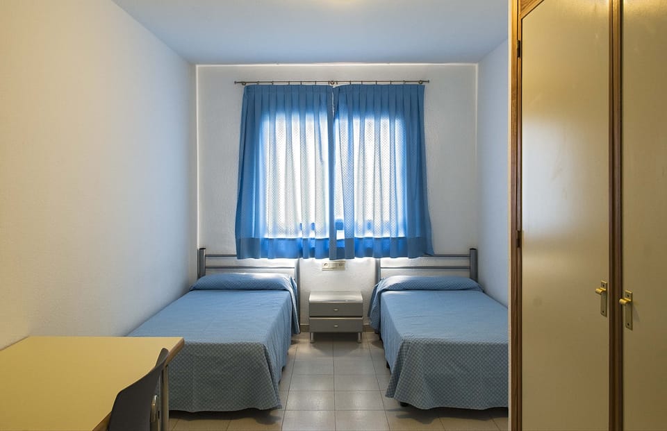 Desk, blackout drapes, WiFi (free), bed sheets