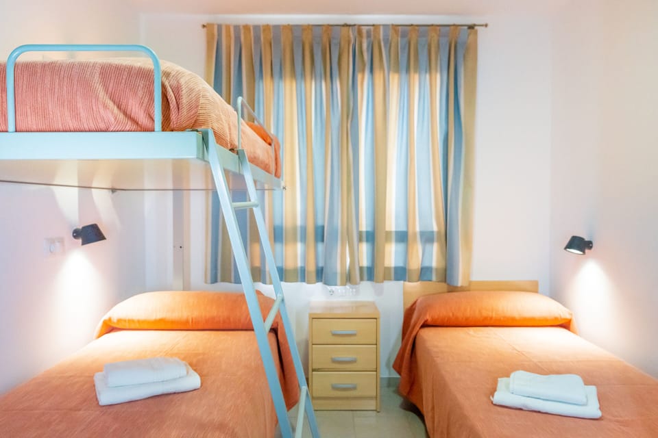 Desk, blackout drapes, WiFi (free), bed sheets