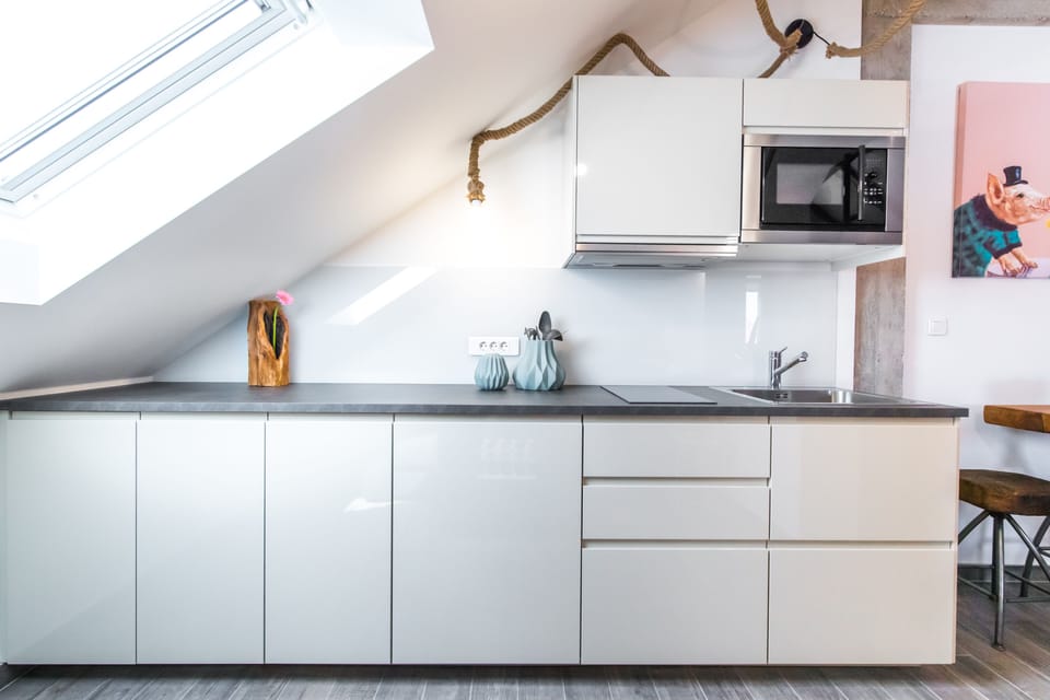 Design Loft | Private kitchen | Mini-fridge, electric kettle, highchair, cookware/dishes/utensils